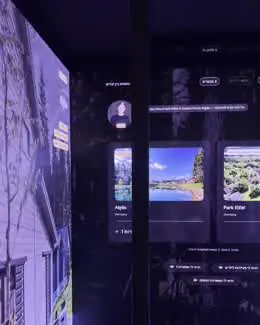 Holiday park options displayed on the walls of the GoQube room